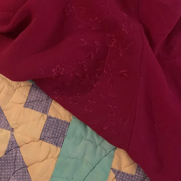 Size 14 deep red dress. Beautiful embossed flowers in the back an on sleeves - Picture 2 of 3